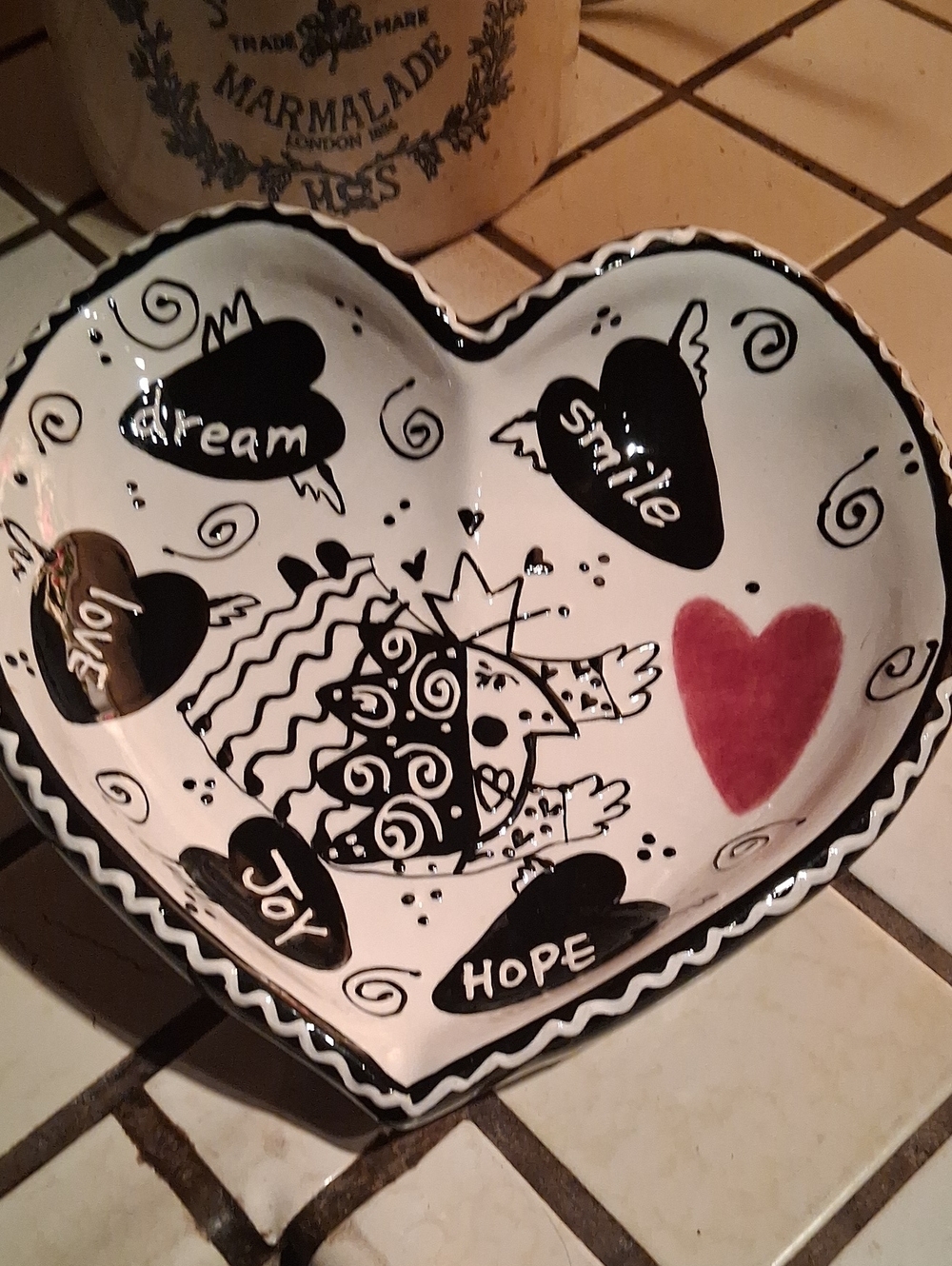 Heart-Shaped Decorative Dish in White with Black Accents and Red Heart